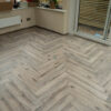 Fusion Herringbone 12mm Tornado Grey Oak 4V Laminate Flooring