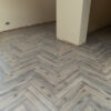 Fusion Herringbone 12mm Tornado Grey Oak 4V Laminate Flooring