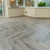 Fusion Herringbone 12mm Tornado Grey Oak 4V Laminate Flooring