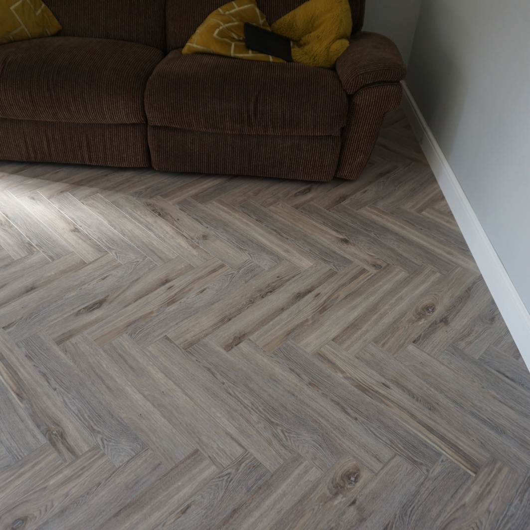 Fusion Herringbone 12mm Tornado Grey Oak 4V Laminate Flooring