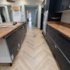 Fusion Herringbone 12mm Grey Beige Oak 4V Laminate Flooring