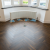 Fusion Herringbone 12mm Espresso Oak 4V Laminate Flooring