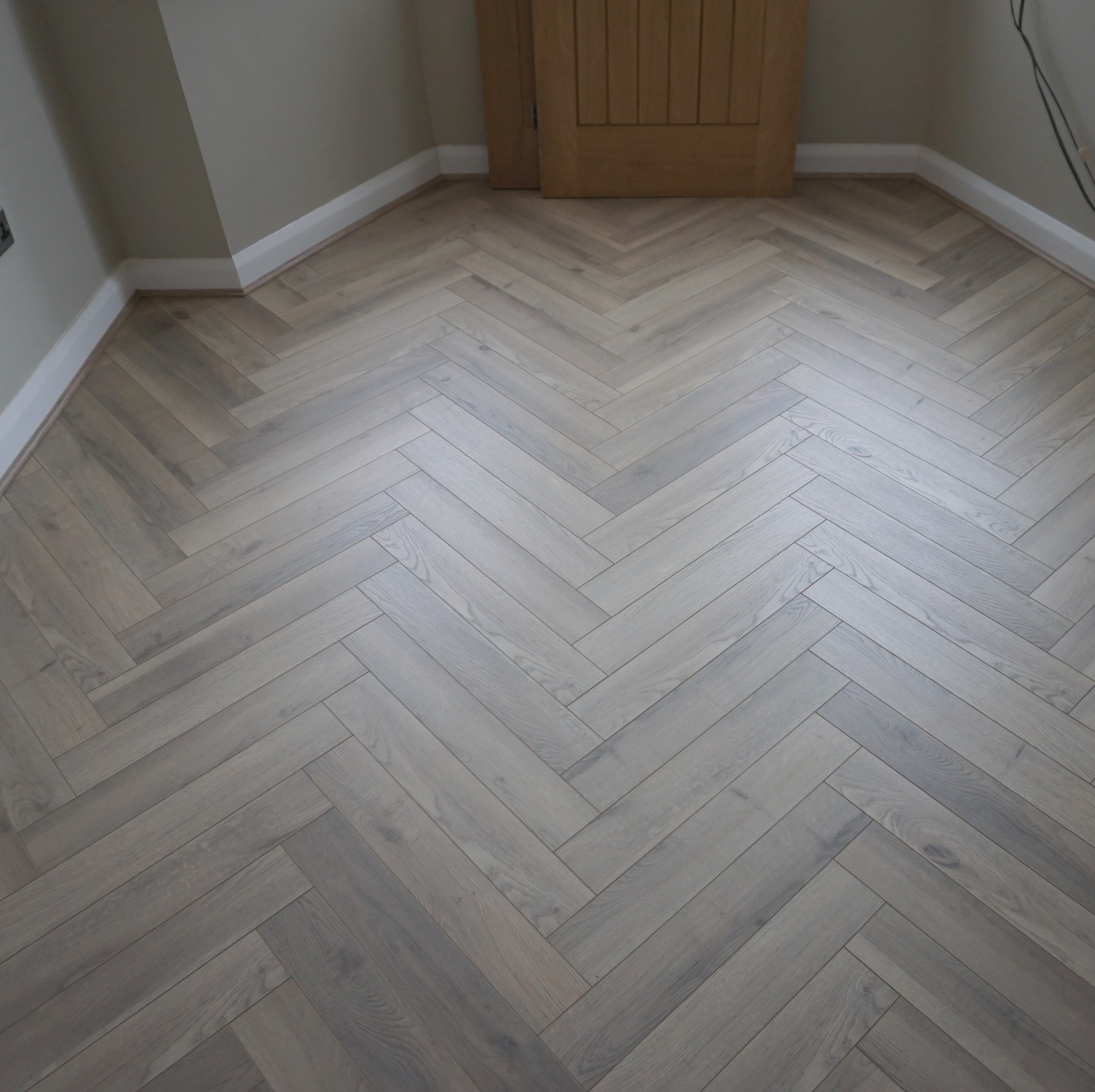 Fusion Herringbone 12mm Grey Beige Oak 4V Laminate Flooring