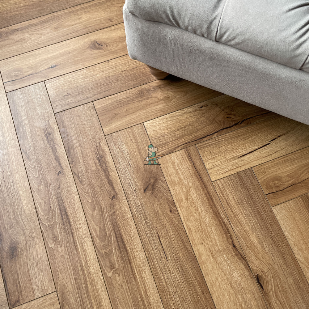 Fusion Herringbone 12mm Smoked Oak 4V Laminate Flooring