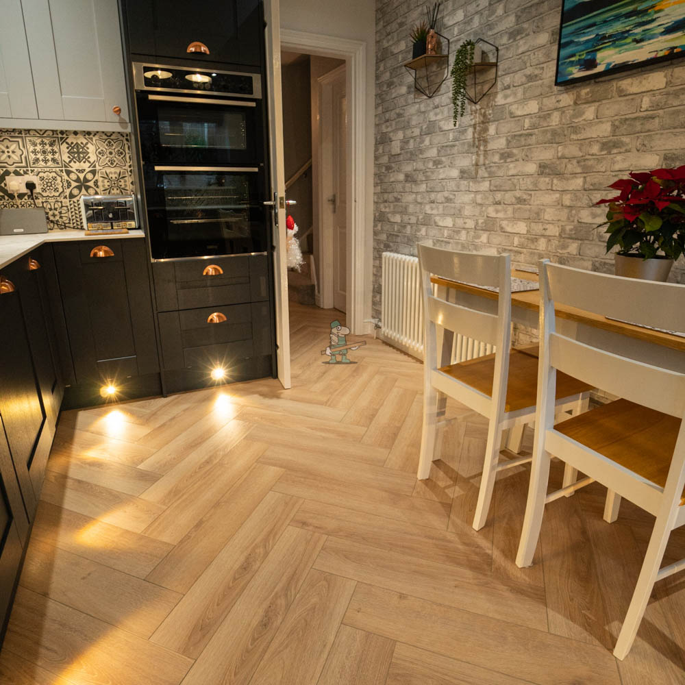 Nature AC6 Herringbone 12mm Shortbread Oak Laminate Flooring