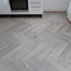 Fusion Herringbone 12mm Embossed Grey Oak 4V Laminate Flooring