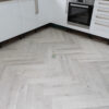 Fusion Herringbone 12mm Embossed Grey Oak 4V Laminate Flooring