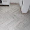 Fusion Herringbone 12mm Embossed Grey Oak 4V Laminate Flooring