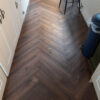 Dolcevita Herringbone 8mm Espresso Oak 4V Laminate Flooring