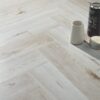 Dolcevita Herringbone 8mm Shell White Oak 4V Laminate Flooring