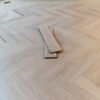 Craft Herringbone 12mm Glacier Oak Laminate Flooring