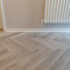 Craft AC5 Herringbone 12mm Castle Grey Oak Laminate Flooring