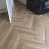 46sqm 📦 Pallet DEAL – 12mm Herringbone Grey Beige Oak Laminate Flooring