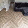 46sqm 📦 Pallet DEAL – 12mm Herringbone Grey Beige Oak Laminate Flooring