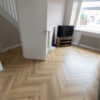 Fusion Herringbone 12mm Shortbread Oak 4V Laminate Flooring