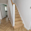 Fusion Herringbone 12mm Shortbread Oak 4V Laminate Flooring