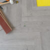 46sqm 📦 Pallet DEAL – 12mm Herringbone Embossed Grey Oak Laminate Flooring