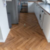 46sqm 📦 Pallet DEAL – 12mm Herringbone Smoked Oak Laminate Flooring