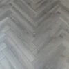 46sqm 📦 Pallet DEAL – 12mm Herringbone Moon Grey Oak Laminate Flooring
