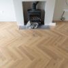 46sqm 📦 Pallet DEAL – 12mm Herringbone Shortbread Oak Laminate Flooring