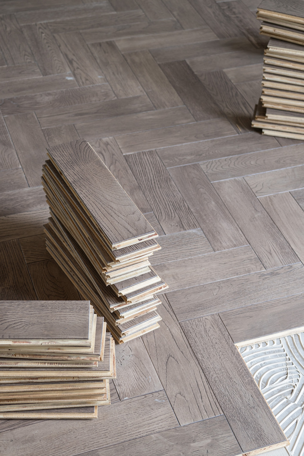 What is the difference between Solid Wood and Engineered Wood Flooring?